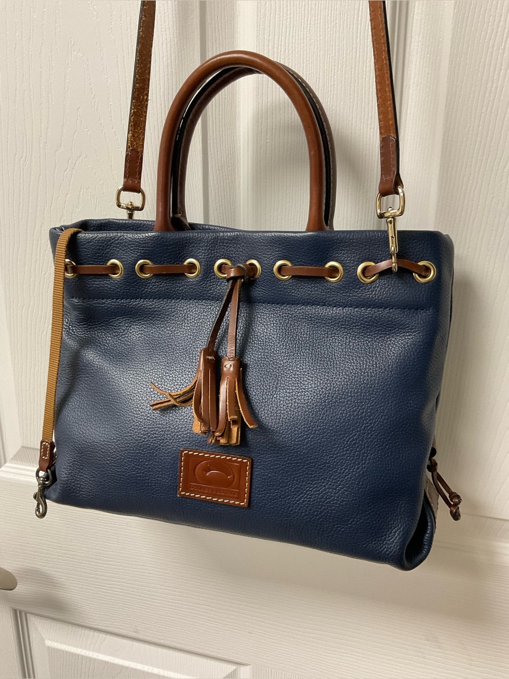 Dooney & Bourke Navy and Brown Leather Drawstring Shoulder Bag